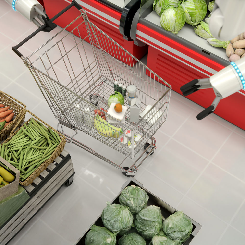 A shopping cart is being guided by a robotic arm in a supermarket. Various fresh vegetables and groceries are visible around the cart.
